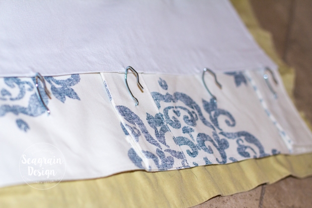 DIY No-Sew Blackout Curtain Liners by Seagrain Design | Step 7: Pin on the drapery hooks