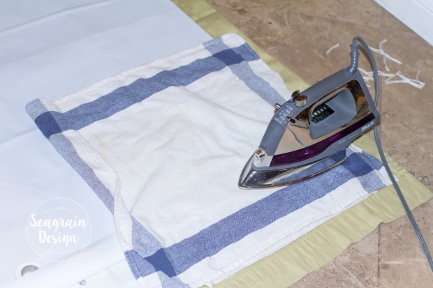 DIY No-Sew Blackout Curtain Liners by Seagrain Design | Step 5: Taping and ironing the hems